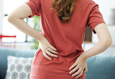 Woman with lower back pain