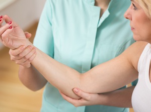 Education about elbow pain and chiropractic care