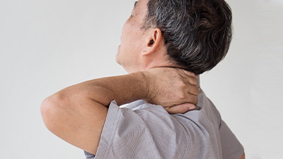Man suffering with neck pain